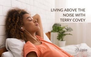 Living Above the Noise with Terry Covey | woman in orange shirt reclining on a pillow relaxing with ear buds in ears