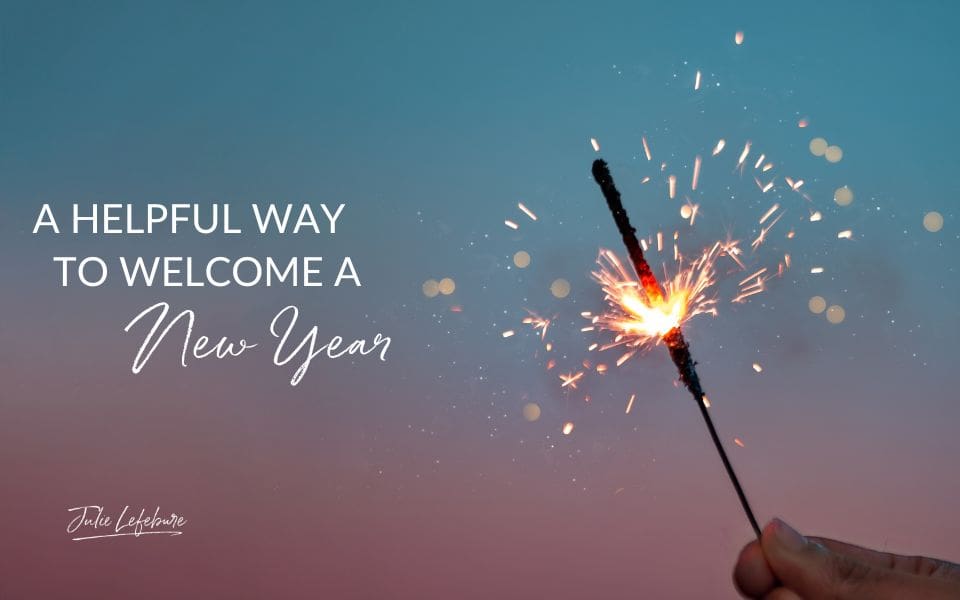 A Helpful Way to Welcome a New Year | a hand holding a sparkler