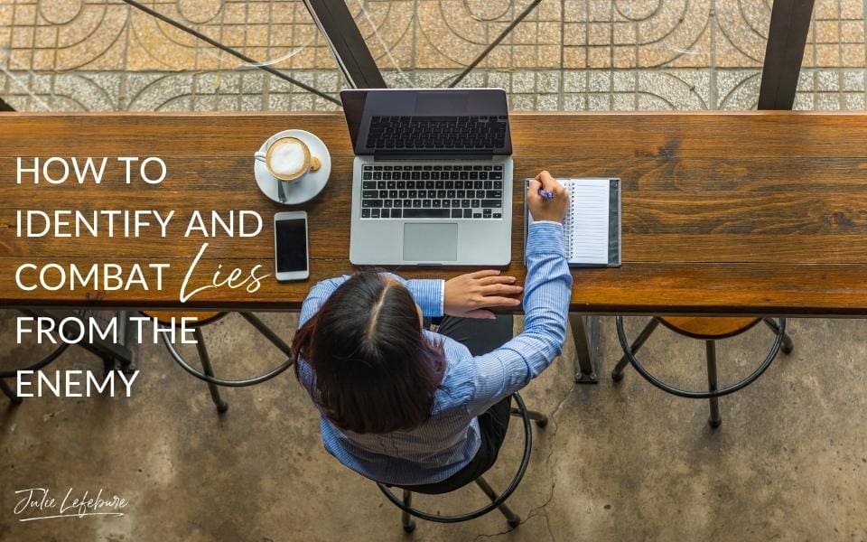 188 How to Identify and Combat Lies From the Enemy | overhead photo of woman sitting at table with open laptop, phone, coffee cup while writing in a notebook
